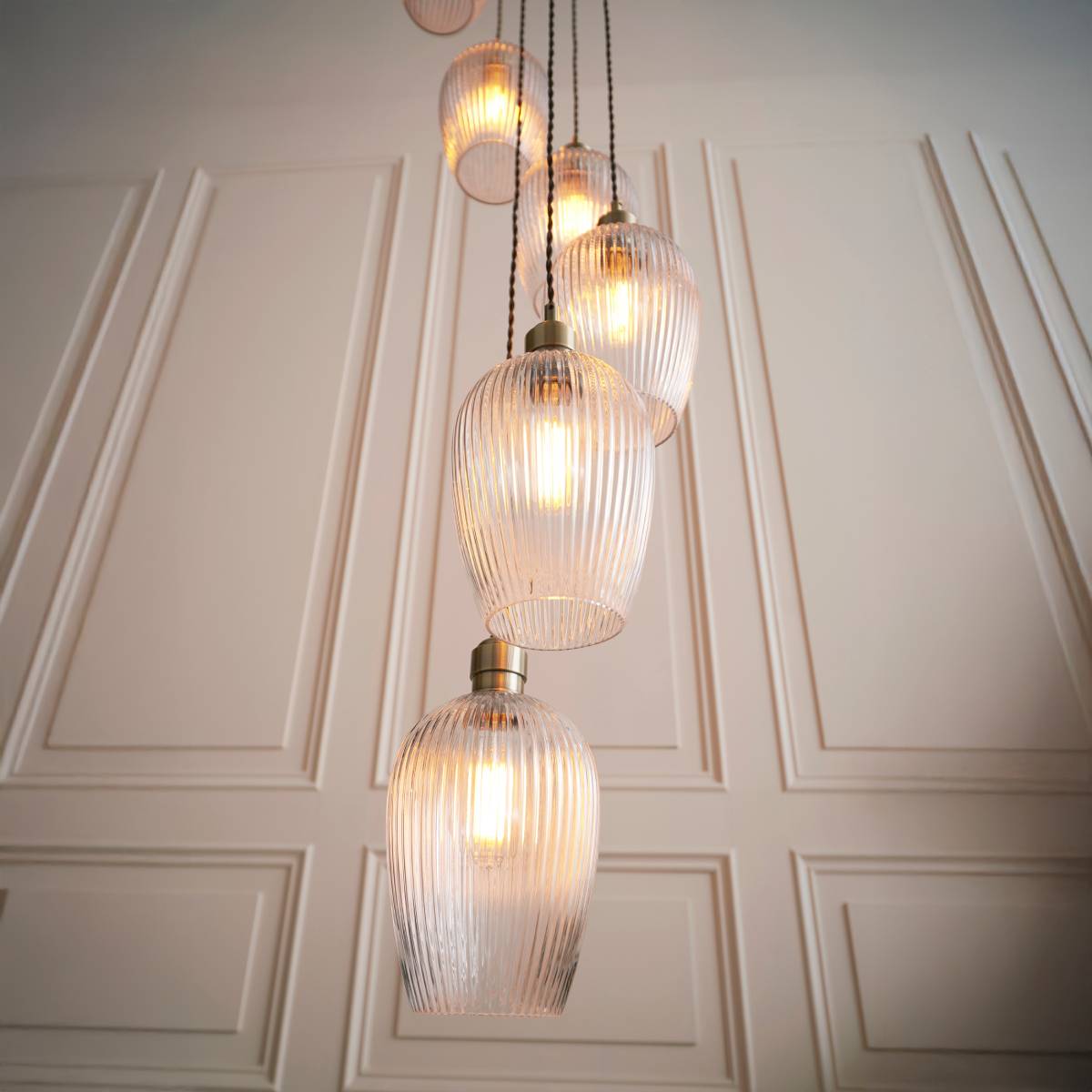 Novena Lavaur 13 Light Cascade Pendant in Antique Brass with Clear Ribbed Glass Shades
