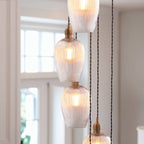 Novena Lavaur 13 Light Cascade Pendant in Antique Brass with Clear Ribbed Glass Shades