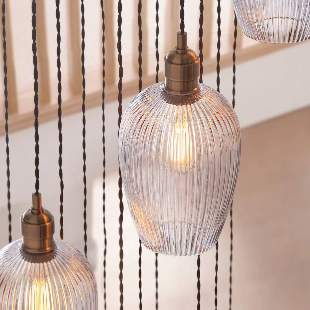 Novena Lavaur 13 Light Cascade Pendant in Antique Brass with Clear Ribbed Glass Shades