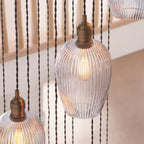 Novena Lavaur 13 Light Cascade Pendant in Antique Brass with Clear Ribbed Glass Shades