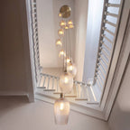 Novena Lavaur 13 Light Cascade Pendant in Antique Brass with Clear Ribbed Glass Shades