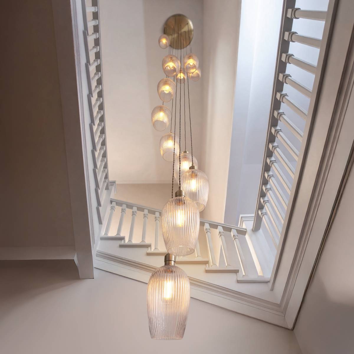 Novena Lavaur 13 Light Cascade Pendant in Antique Brass with Clear Ribbed Glass Shades