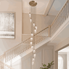 Novena Lavaur 13 Light Cascade Pendant Light in Antique Brass with Clear Glass Shades