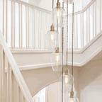 Novena Lavaur 13 Light Cascade Pendant Light in Antique Brass with Clear Glass Shades