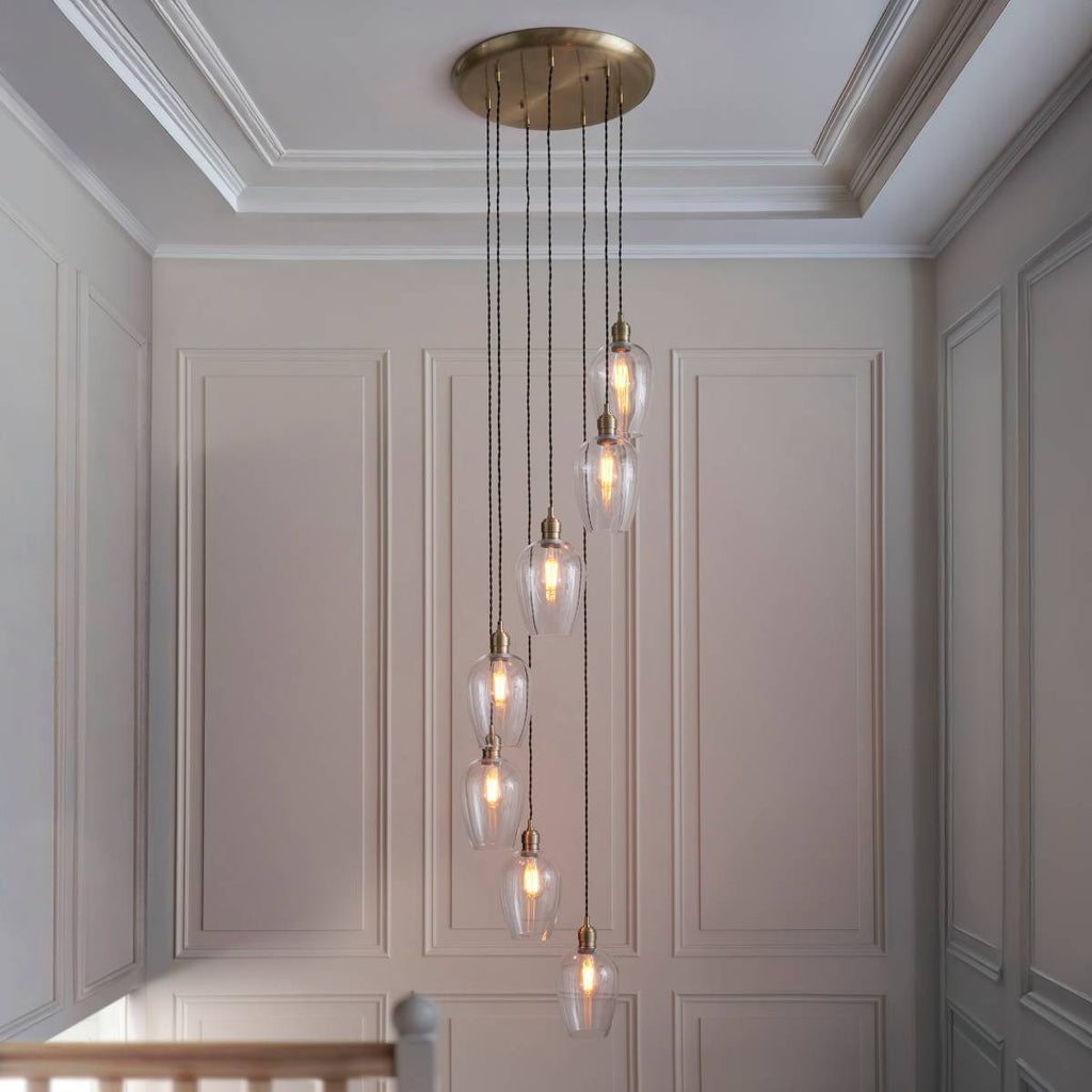 Novena Lavaur 7 Light Cascade Pendant in Antique Brass with Clear Glass Shades