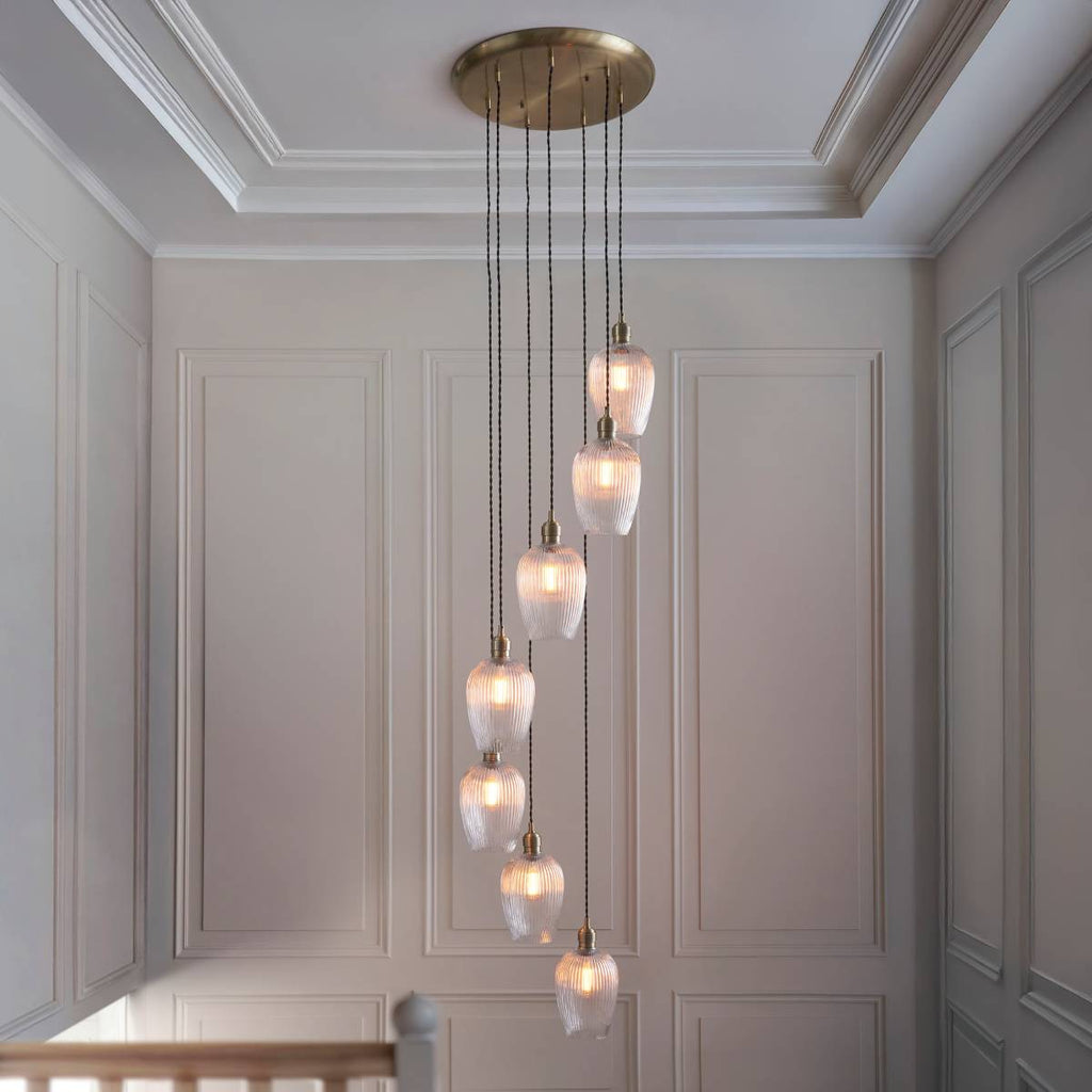 Novena Lavaur 7 Light Cascade Pendant in Antique Brass with Clear Ribbed Glass Shades
