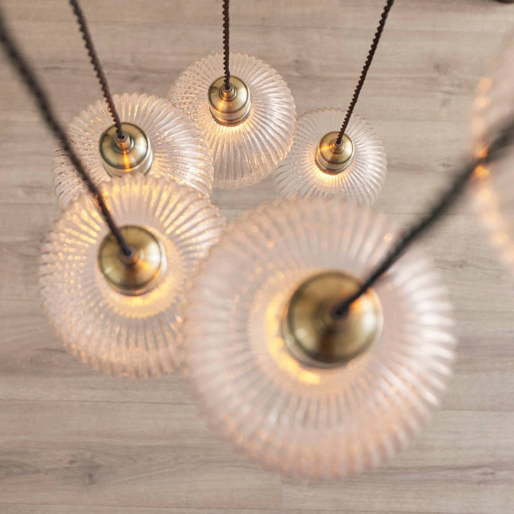 Novena Lavaur 7 Light Cascade Pendant in Antique Brass with Clear Ribbed Glass Shades
