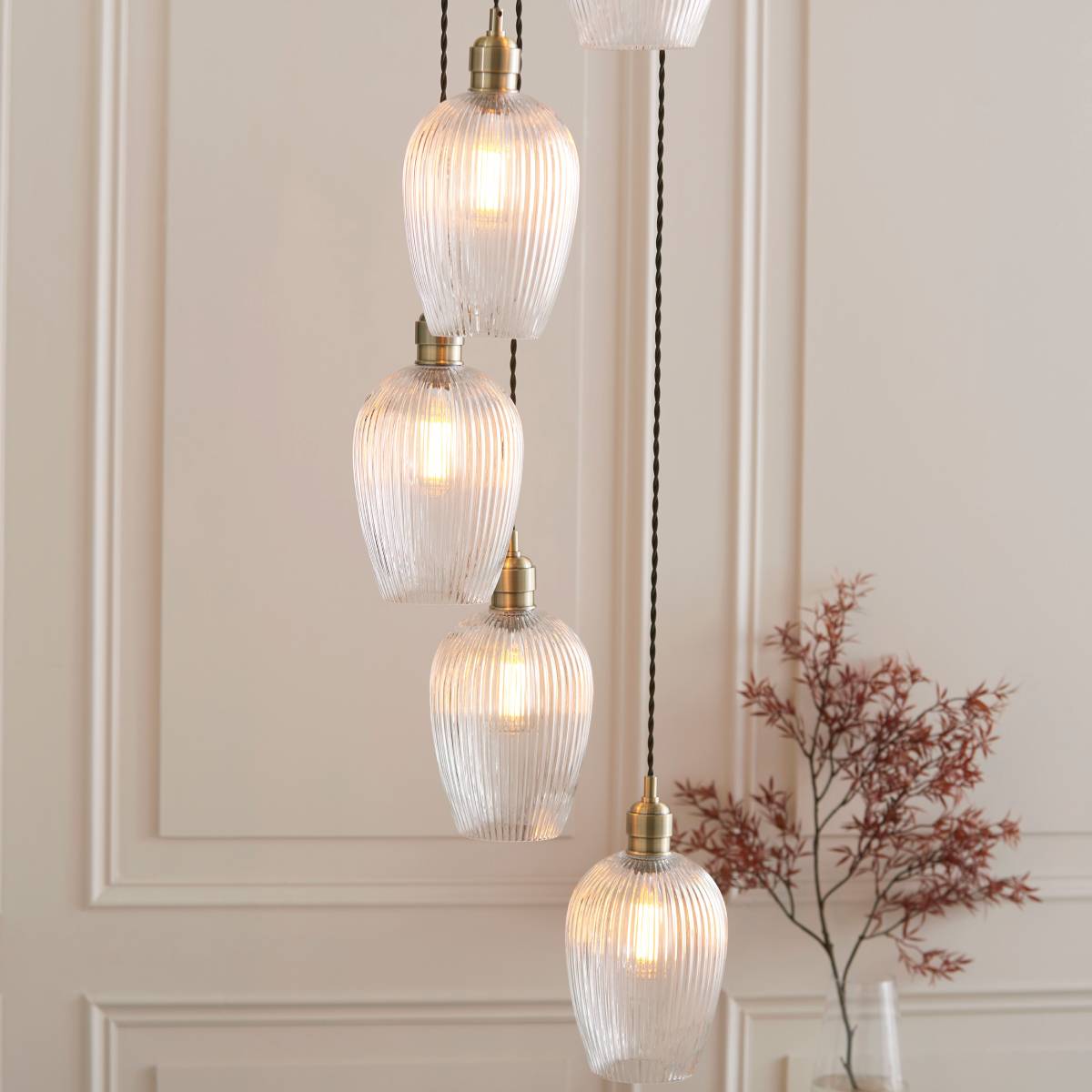 Novena Lavaur 7 Light Cascade Pendant in Antique Brass with Clear Ribbed Glass Shades