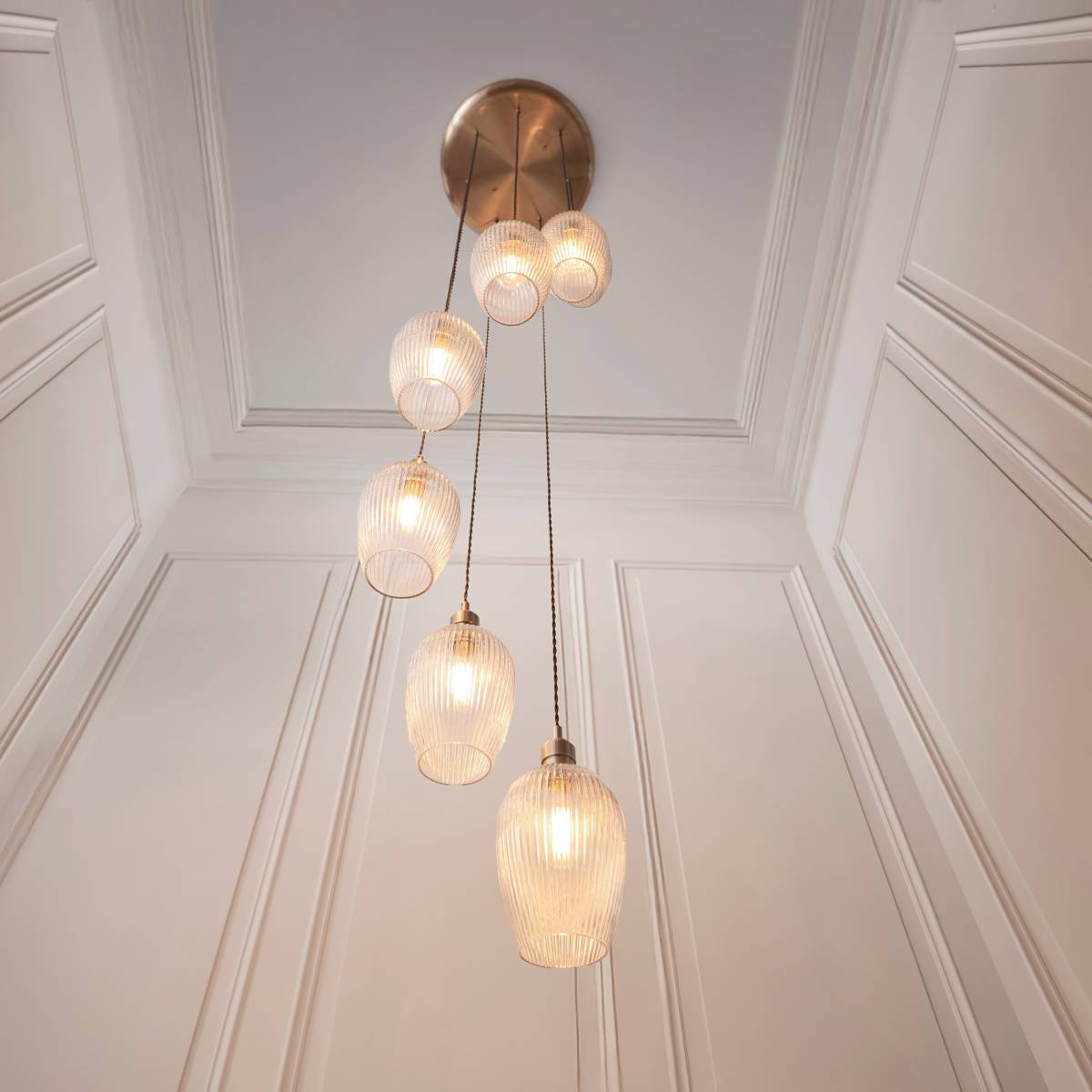 Novena Lavaur 7 Light Cascade Pendant in Antique Brass with Clear Ribbed Glass Shades