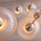 Novena Lavaur 7 Light Cascade Pendant in Bright Nickel with Clear Ribbed Glass Shades