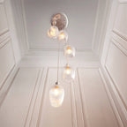 Novena Lavaur 7 Light Cascade Pendant in Bright Nickel with Clear Ribbed Glass Shades