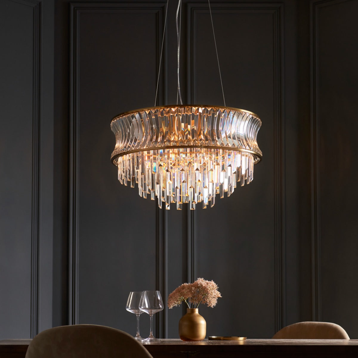 Novena Nava 9 Light Pendant Light with Crystal and Clear Glass in Warm Brass Plate