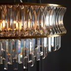 Novena Nava 9 Light Pendant Light with Crystal and Clear Glass in Warm Brass Plate