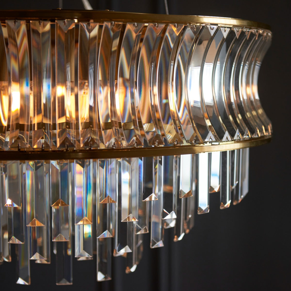Novena Nava 9 Light Pendant Light with Crystal and Clear Glass in Warm Brass Plate