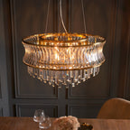 Novena Nava 9 Light Pendant Light with Crystal and Clear Glass in Warm Brass Plate