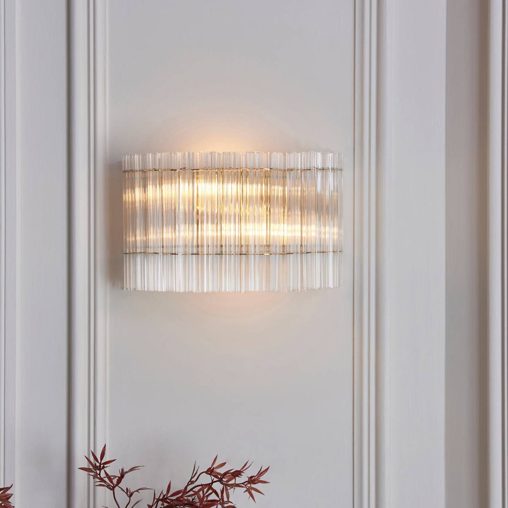 Novena Pourtel 2 Light Wall Light in Brushed Aged Brass with Clear Glass Shade