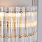 Novena Pourtel 2 Light Wall Light in Brushed Aged Brass with Clear Glass Shade