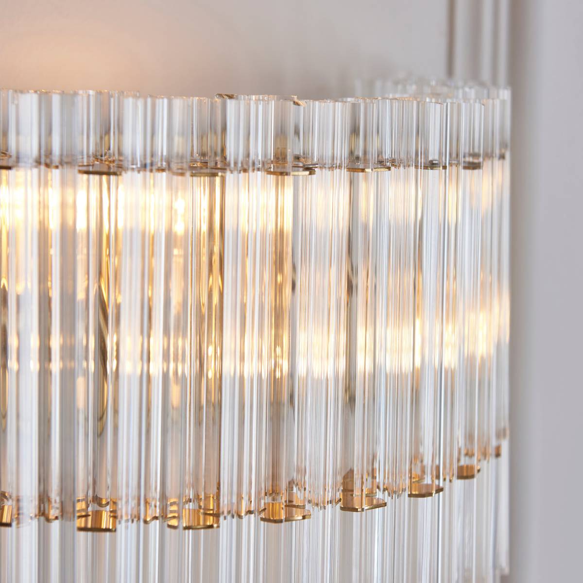 Novena Pourtel 2 Light Wall Light in Brushed Aged Brass with Clear Glass Shade