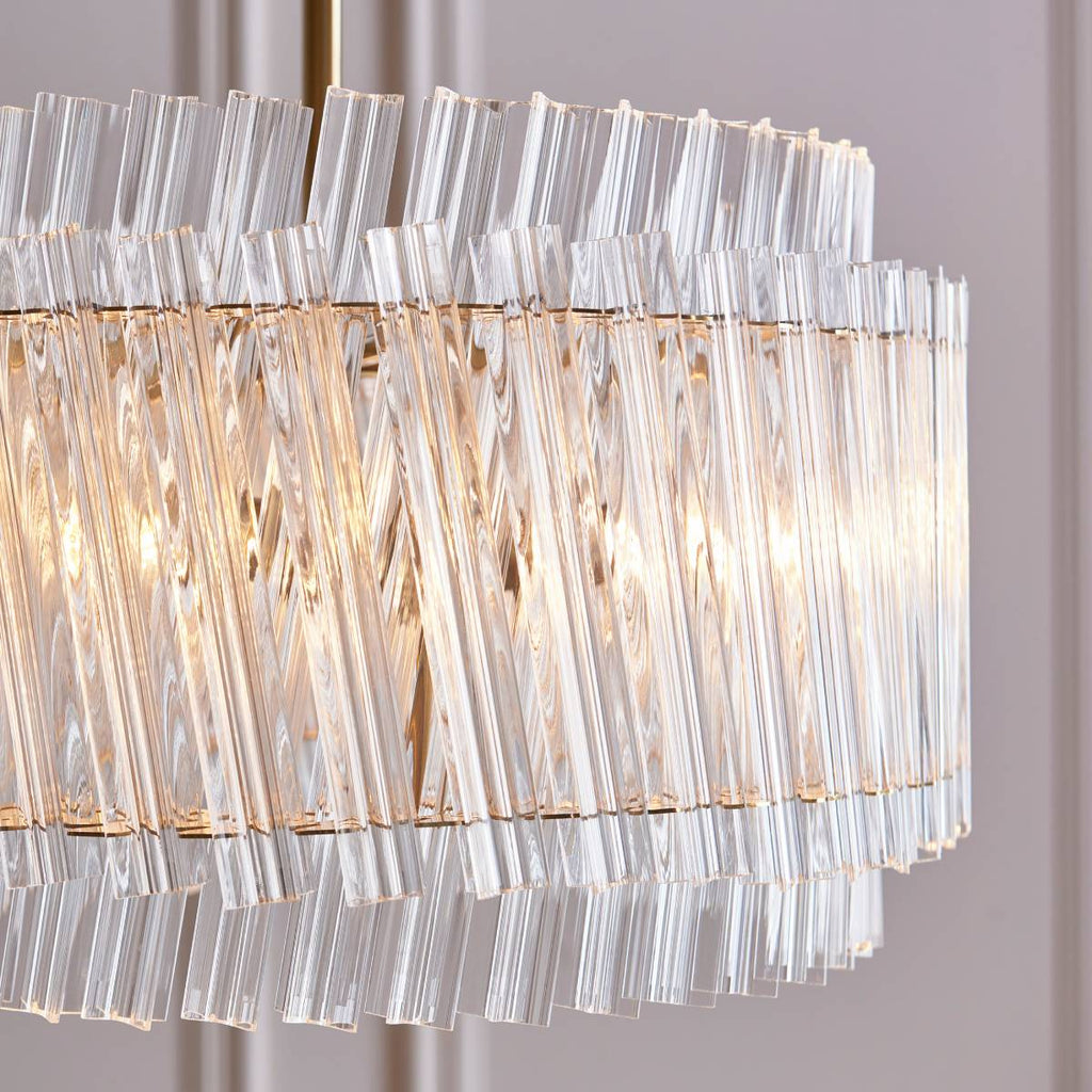 Novena Pourtel 3 Light Pendant in Brushed Aged Brass with Clear Glass Rod Shades