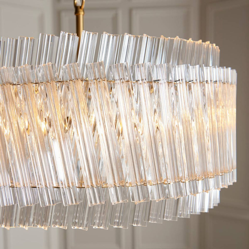 Novena Pourtel 5 Light Pendant in Brushed Aged Brass with Clear Glass Shade