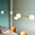 Novena Sobrado 5 Light Linear Pendant Light Opal Glass Antique Brass