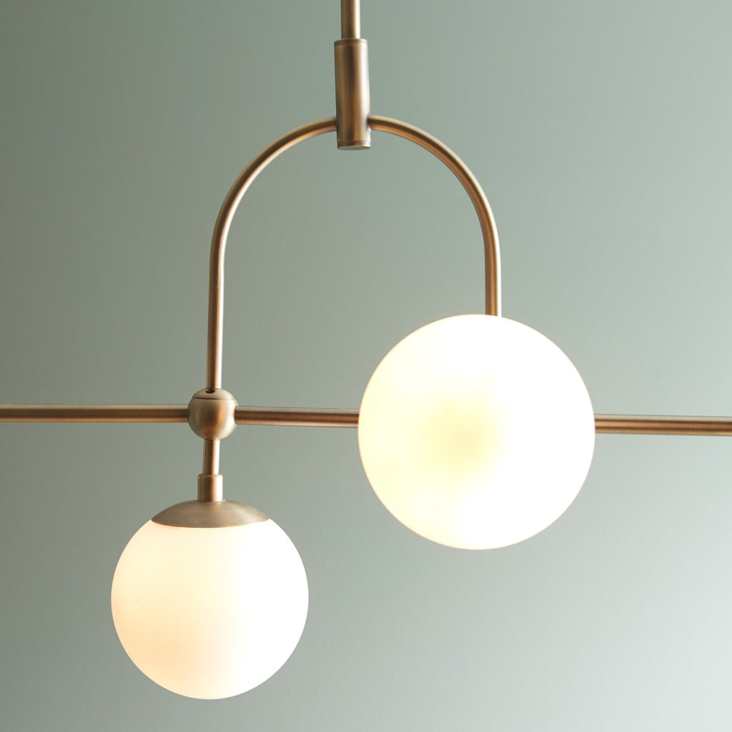 Novena Sobrado 5 Light Linear Pendant Light Opal Glass Antique Brass