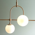 Novena Sobrado 5 Light Linear Pendant Light Opal Glass Antique Brass
