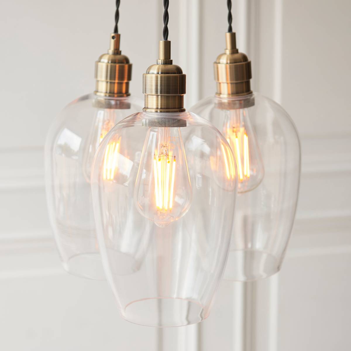 Novena Tarn 3 Light Cluster Pendant in Antique Brass with Clear Glass Shades