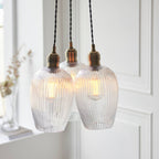 Novena Tarn 3 Light Cluster Pendant in Antique Brass with Clear Ribbed Glass Shades