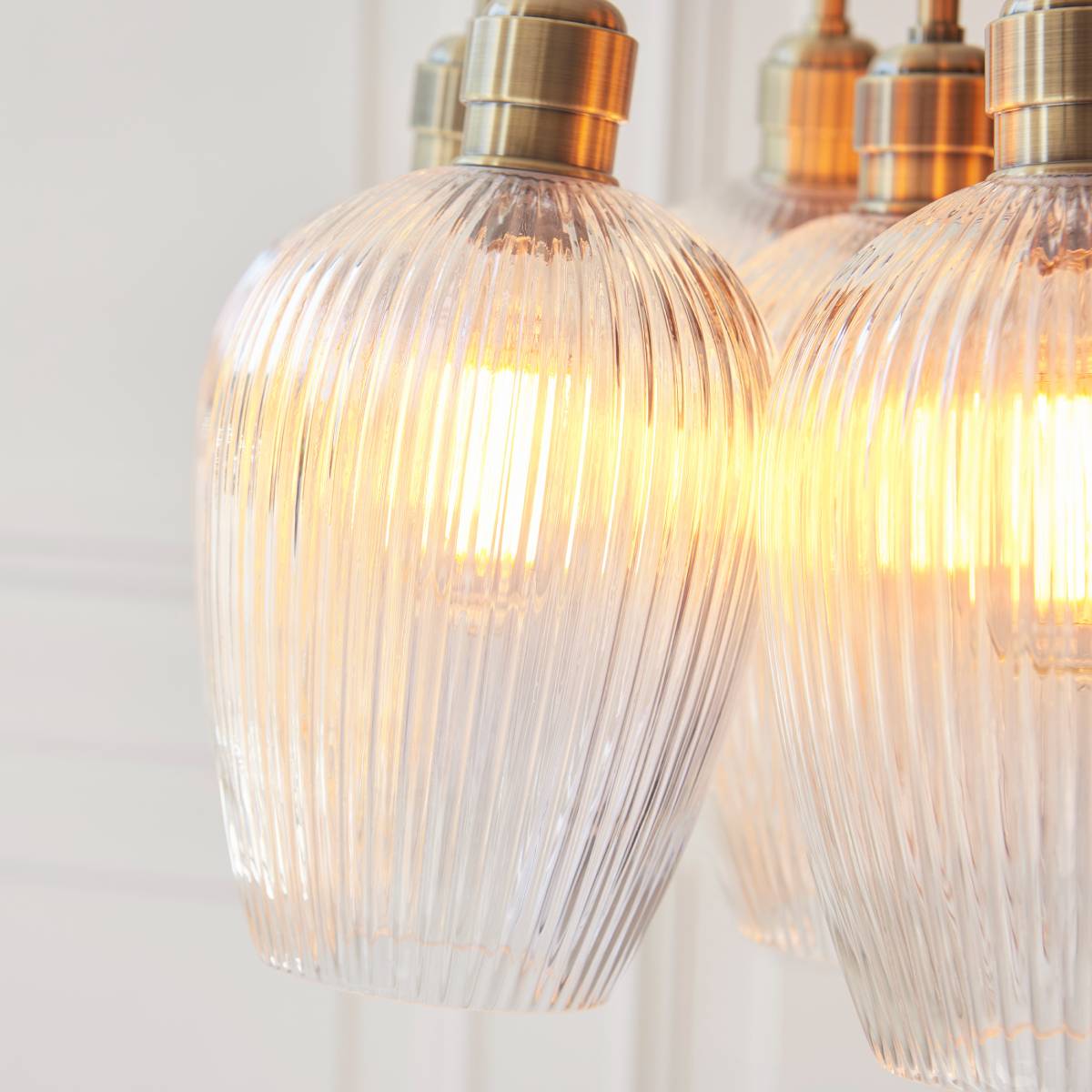 Novena Tarn 7 Light Cluster Pendant Antique Brass with Clear Ribbed Glass Shades