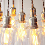 Novena Tarn 7 Light Cluster Pendant in Bright Nickel with Clear Glass Shades