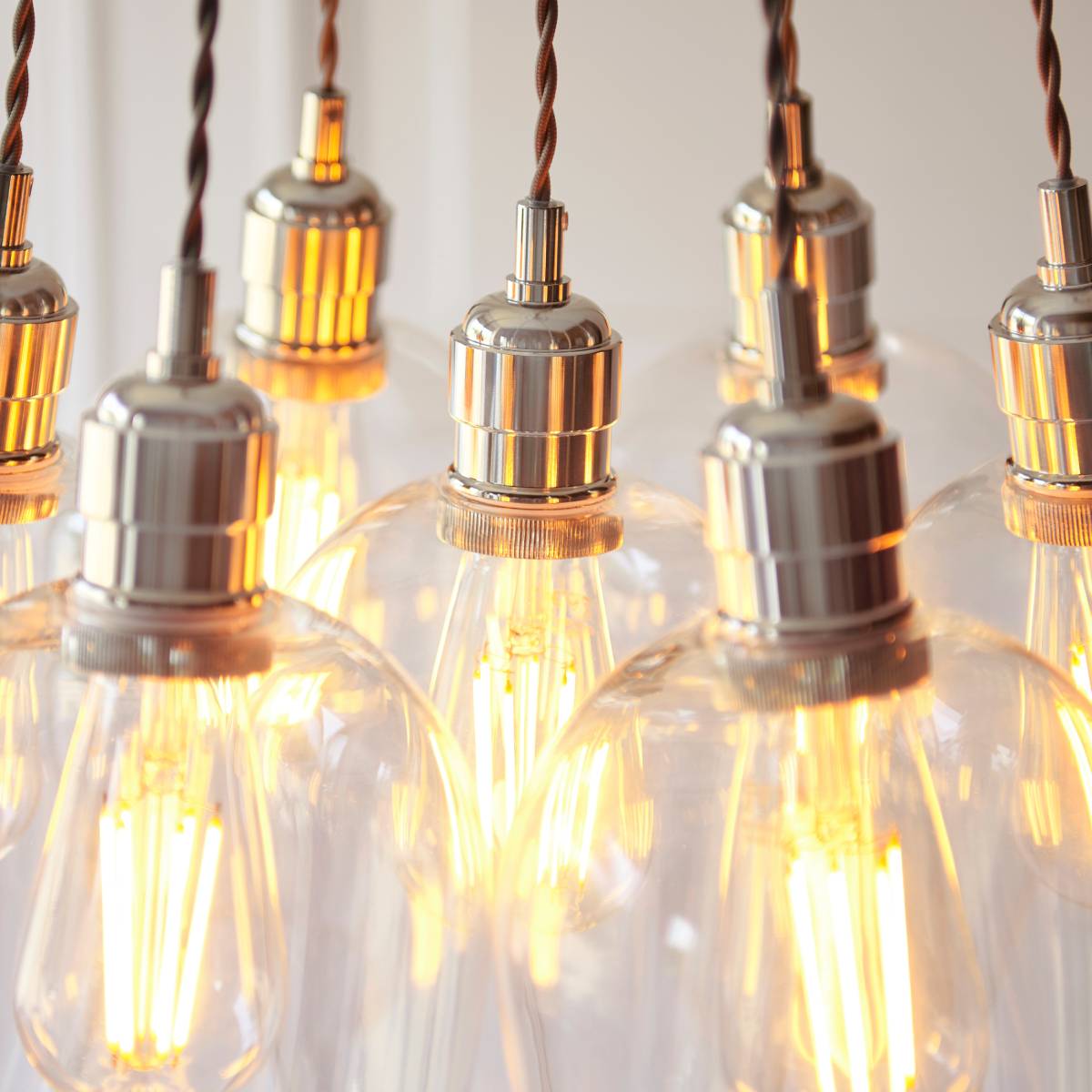 Novena Tarn 7 Light Cluster Pendant in Bright Nickel with Clear Glass Shades