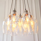 Novena Tarn 7 Light Cluster Pendant in Bright Nickel with Clear Glass Shades