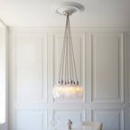 Novena Tarn 7 Light Cluster Pendant in Bright Nickel with Clear Ribbed Glass Shades