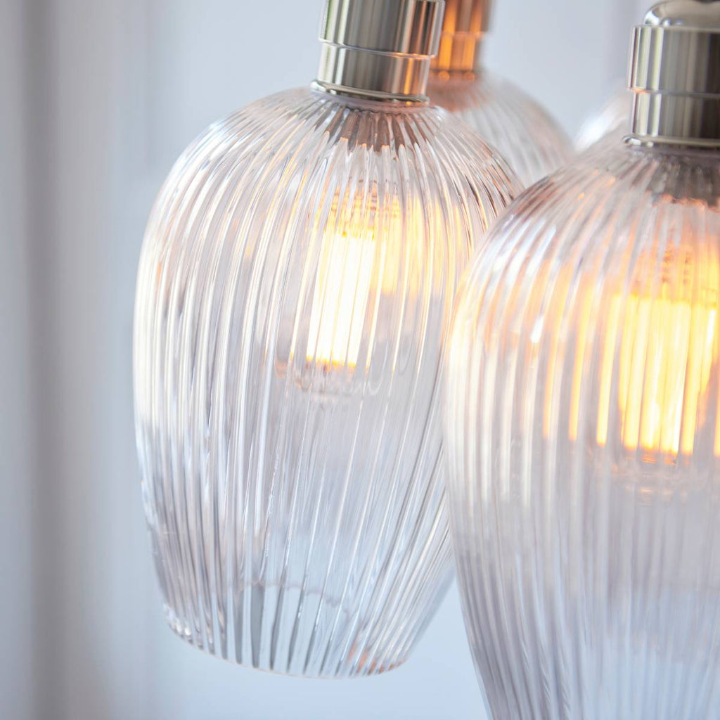 Novena Tarn 7 Light Cluster Pendant in Bright Nickel with Clear Ribbed Glass Shades