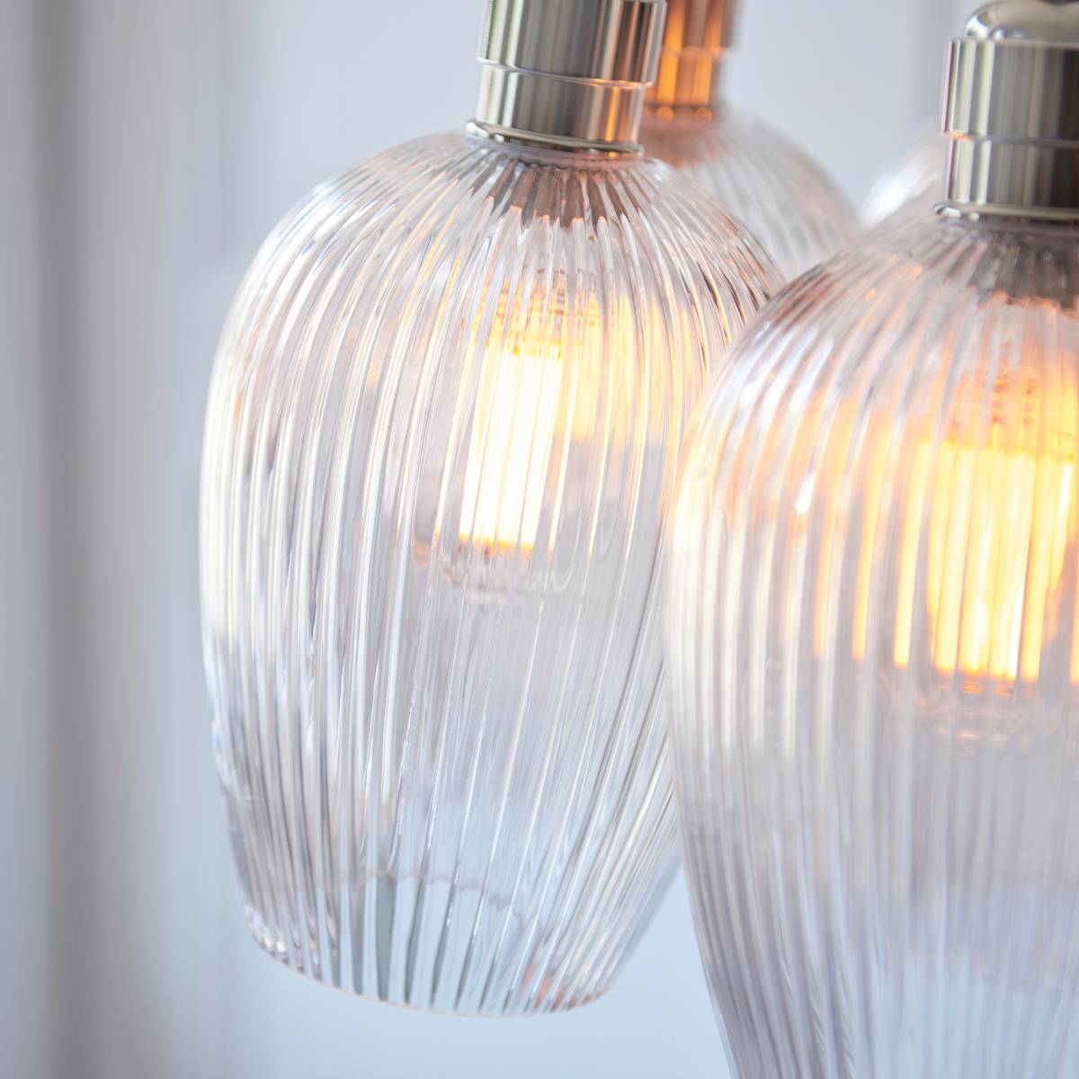 Novena Tarn 7 Light Cluster Pendant in Bright Nickel with Clear Ribbed Glass Shades