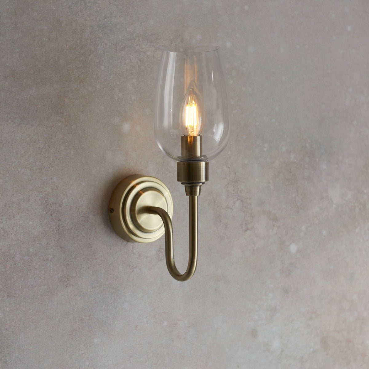 Novena Travessa 1 Light Wall Light Clear Glass Antique Brass Plate