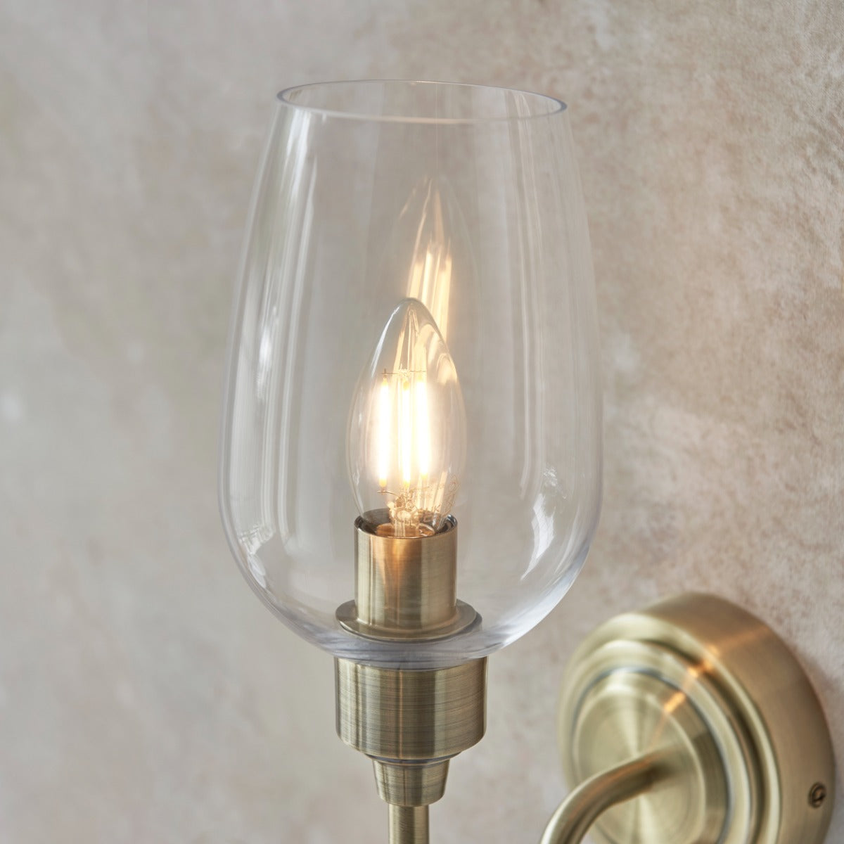 Novena Travessa 1 Light Wall Light Clear Glass Antique Brass Plate