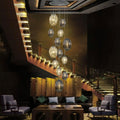 Schuller Ovila 13 Light Pendant Light in Chrome with Cognac and Smoky Grey