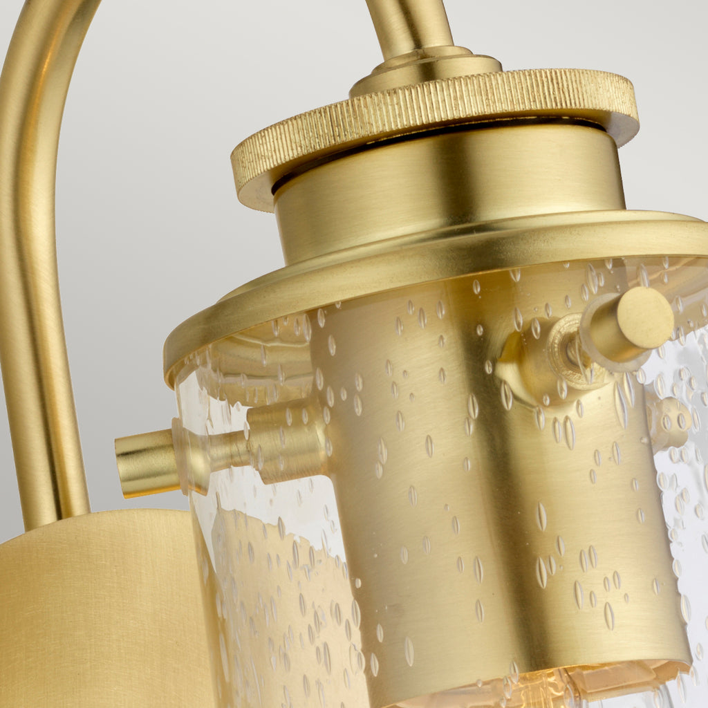 Quintiesse Braelyn 1 Light Wall Light Brushed Brass Clear Seedy Glass