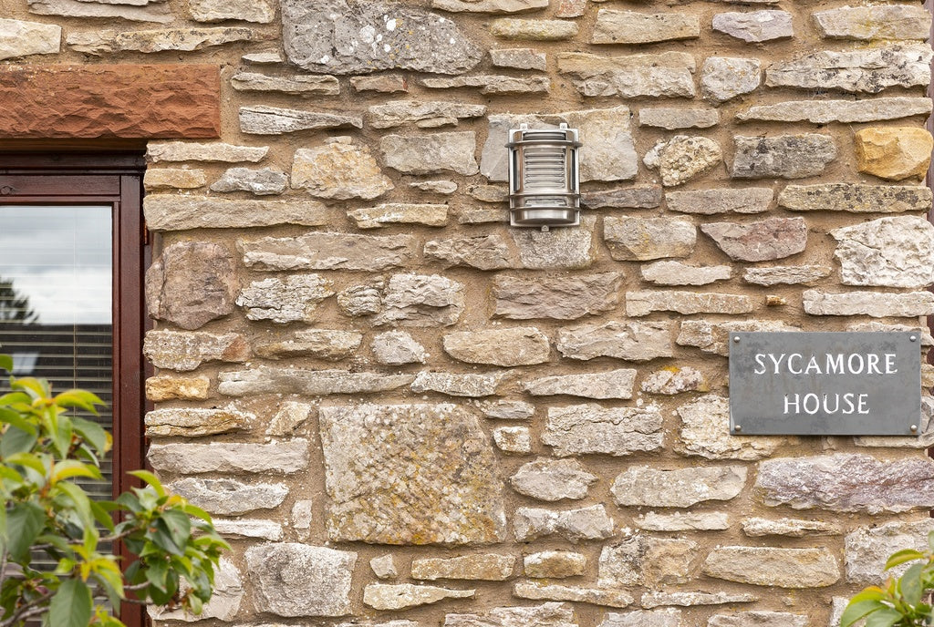 Navigator Cargo Wall Light in Solid Brass